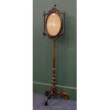 Victorian rosewood floral embroidered pole screen raised on tripod base.