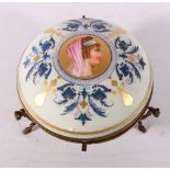 French porcelain domed box and cover with ormolu style mounts, the lid with handpainted vignette