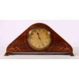 Art Nouveau mahogany and inlaid mantle clock of triangular form raise on bracket feet with French