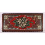 Victorian bead work panel within mahogany tray raised on coasters, 64cm long