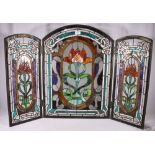 Leaded stained glass triptych firescreen with tulip design, 72cm tall
