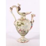 Veuve Perrin pottery ewer decorated with figures, masks and Bacchus, 39cm tall