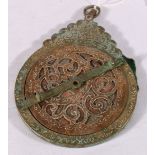 Islamic brass astrolabe with five discs, 20cm tall