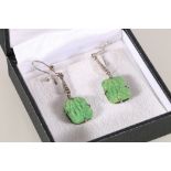 Pair of Art Deco style carved jade type hardstone pendant earrings set with marcasite stones