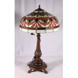 Contemporary bronzed effect table number with Tiffany style leaded stained glass  shade, 66cm tall