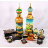 Two Continental hand painted wooden jars in the form of temples, 45cm tall, also eleven Russian