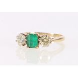 18ct yellow gold diamond and emerald three stone dress ring, the central emerald flanked by two