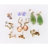 Eight pairs of gold and gilt metal mounted earrings