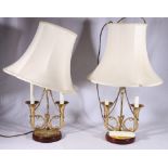Pair of brass table lamps with twin bugle support, 36cm tall