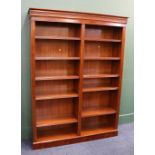 Reproduction mahogany open fronted twelve shelf bookcase, height 183 cm wide 137 cm.