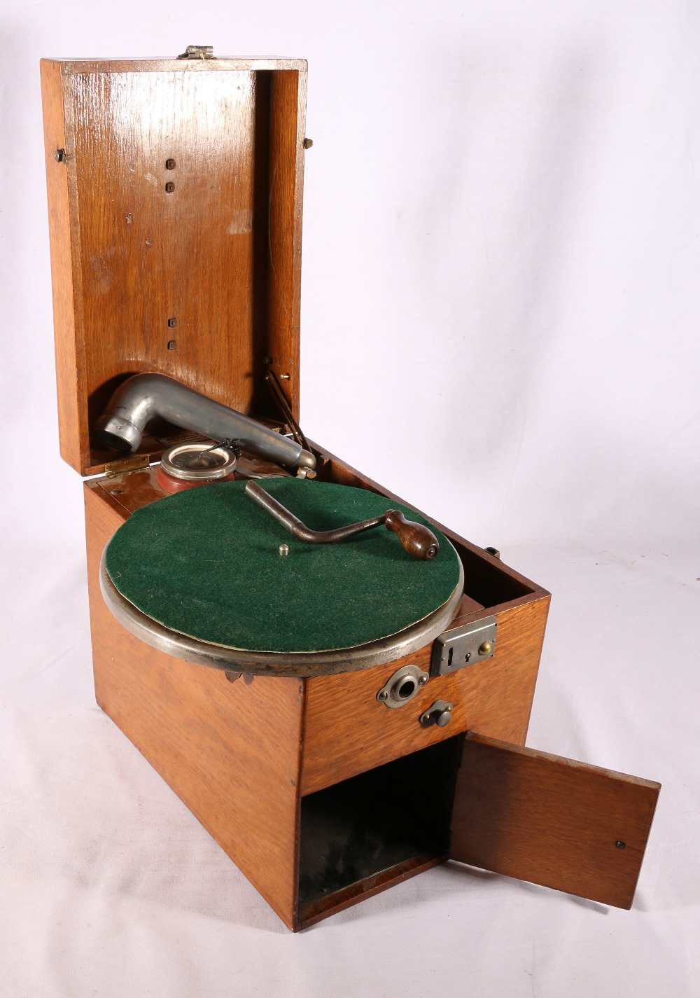 Miller & Son of Cambridge portable gramophone in oak case, 32cm long