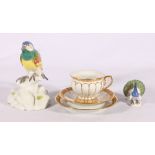 Meissen style Continental porcelain model of a bird, 14cm tall, a model of a peacock and a cabinet