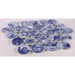 Twenty-six Royal Copenhagen miniature wall plates, 8cm diameter