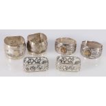 Pair of silver napkin rings with Scottish thistle designs set with faceted Cairngorm citrines