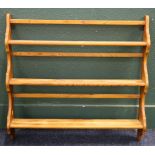 Ercol pine three tier wall mounted plate rack, 78 cm high x 83 cm wide.