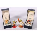Four Halcyon Days Enamels models of teddy bears, the largest 10.5cm tall, two with boxes, (4)