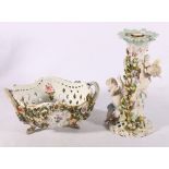 Continental Meissen style candlestick, the column with relief cherubs, 27cm tall also a