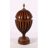 Reproduction treen urn box with pine cone finial, 26cm tall