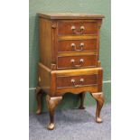 Reproduction mahogany four drawer bedside chest raised on cabriole supports, 70 cm high x 36 cm