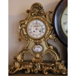 French Rococco style mantle clock with porcelain panel and visible escapement, 50cm tall