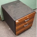 Second half of the 20th century teak and black leathered side cabinet with two drawers, 56cm tall,