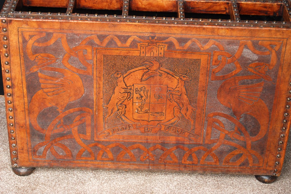 Tooled leather stick stand with armorial Fortis et Fidus, decorated with serpents and cranes, on bun - Image 2 of 4