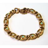 Gold bracelet of curb pattern with oval opal collets, '9c', 13g.