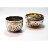 Two silver circular bowls with spiral part fluting, 1881 and 1896.