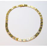 Gold necklet of alternate plain, crescent and ribbed pattern, '750', 46.5g.