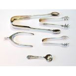 Silver wishbone sugar tongs, another, Newcastle 1842, and three other items.