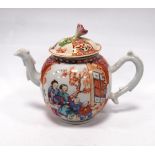 Canton teapot and cover with floral finial and decorated with traditional scenes, 15cm high.