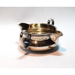 Silver shallow sauce boat, twin spouts and handles, by Asprey, 1918, 3oz.