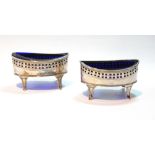 Pair of silver salts of navette shape, pierced and engraved, on moulded tapering feet, original