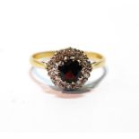 Diamond and garnet cluster ring in 18ct gold, size U.