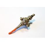 Child's silver embossed rattle with coral teether and whistle, by Hilliard and Thomason,