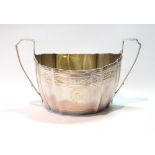 Silver two-handled sugar bowl of oval waved shape, engraved with scrolls, maker's mark rubbed, 1801,