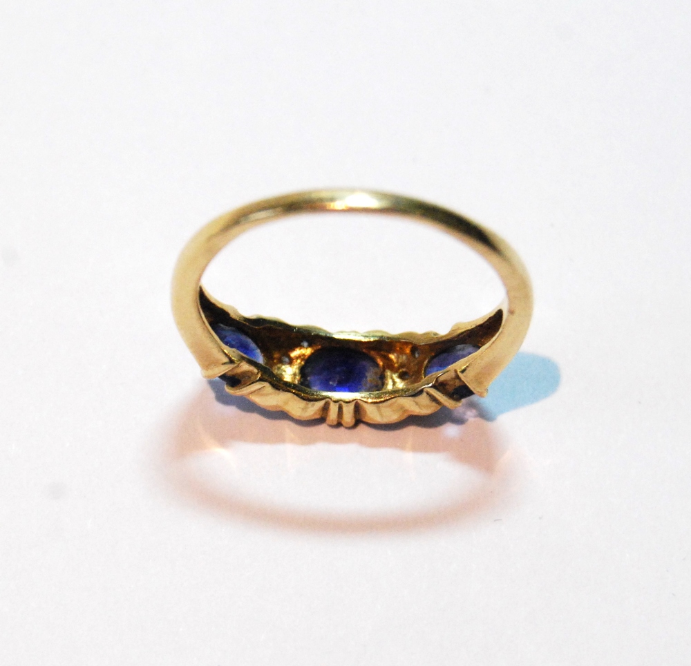 Edwardian style ring of half hoop form with three oval sapphires and scrolls of eight-cut - Image 3 of 3