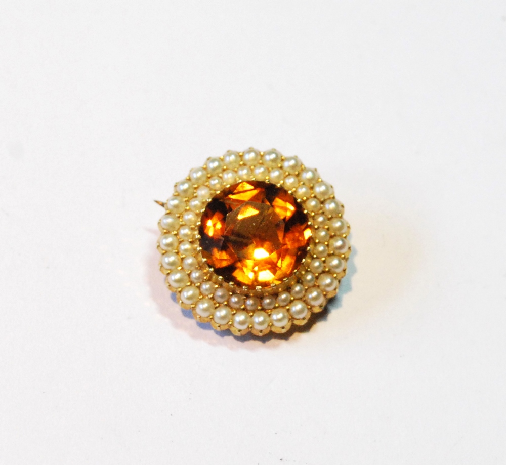 Victorian gold circular brooch with citrine and two rows of pearls, probably 15ct, 22mm.