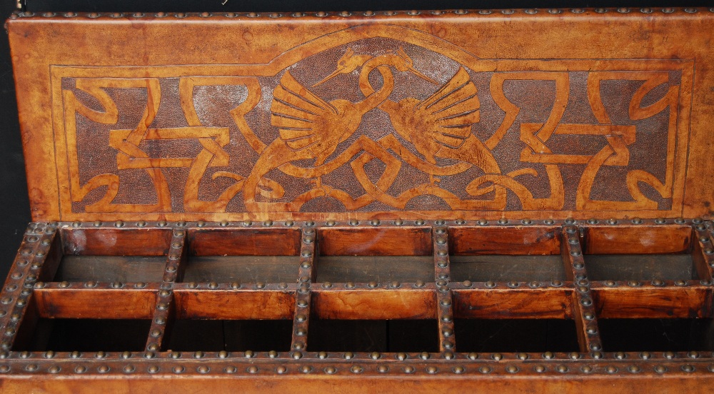 Tooled leather stick stand with armorial Fortis et Fidus, decorated with serpents and cranes, on bun - Image 3 of 4