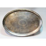 Irish silver oval waiter or teapot stand with bright-cut band and cartouche, moulded edge, on