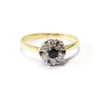 Diamond and sapphire cluster ring in 18ct gold, size P.