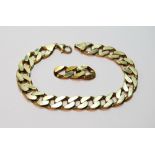 9ct gold identity bracelet of filed curb pattern with two spare links, 35g.