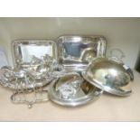 Three e.p. entree dishes and covers, an engraved dish cover, two sauce boats and a toast rack.