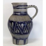 Large antique Westerwald German stoneware jug with incised borders and leaf motifs, 33cm high.