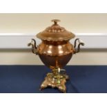 19th century ornate copper samovar with tinned interior, porcelain handles and brass tap fittings.