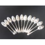 Set of twelve silver desert spoons, initialled by W K P Cunningham Edinburgh 1824.