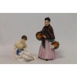 Two Royal Doulton figures: "Treasure Island", HN2243, 13cm high and "The Orange Lady", HN1759,