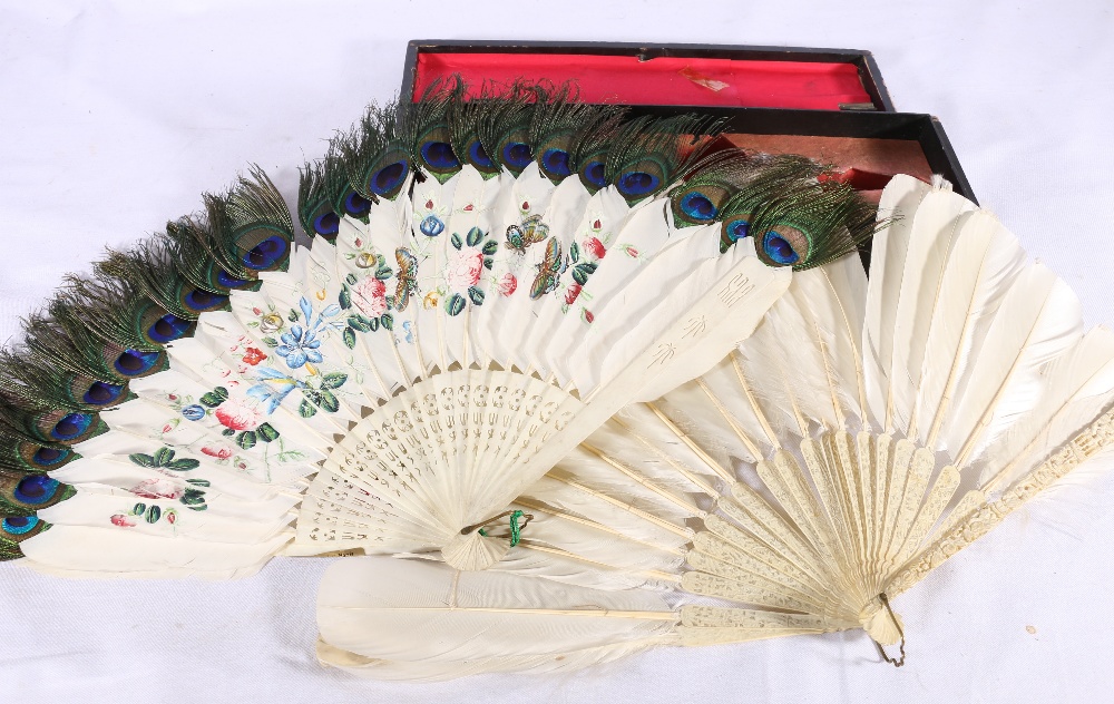 19th Century Chinese ivory brieze fan with white feather sticks, pierced and carved decoration and a