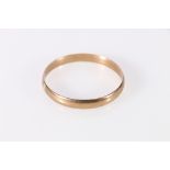 Yellow metal plain bangle stamped 9KT but not likely gold, 28.6g