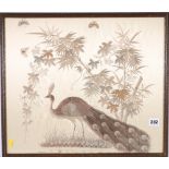 A well stitched Chinese embroidered panel depicting peacock beneath bamboo branches, 40 x 47 cm.